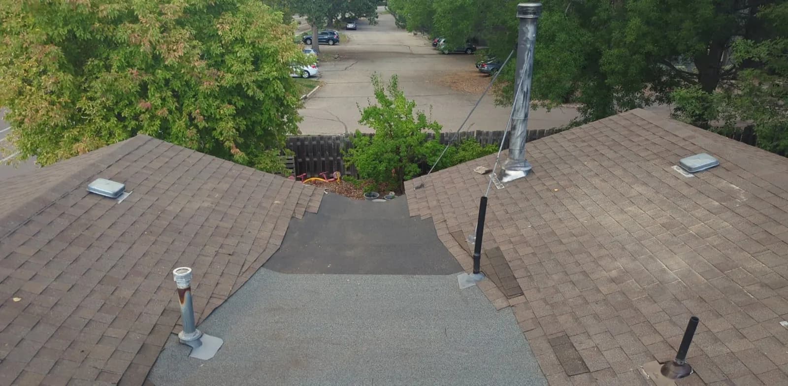 After: Low-slope valley in Fort Collins, rotted wood replaced and re-roofed